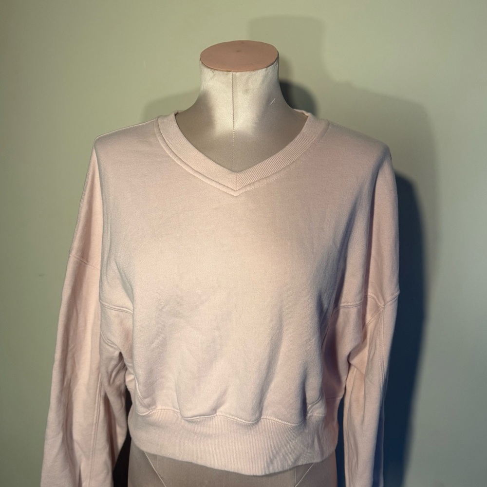 Garage Light Pink Cropped V-Neck Sweatshirt.